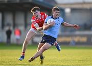 23 April 2024; Greg McEneaney of Dublin in action against Sean Callaghan of Louth during the EirGrid Leinster GAA Football U20 Championship semi-final match between Dublin and Louth at Parnell Park in Dublin. Photo by Sam Barnes/Sportsfile