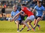 23 April 2024; Evan Nugent of Dublin is tackled by Pearse Grimes Murphy of Louth during the EirGrid Leinster GAA Football U20 Championship semi-final match between Dublin and Louth at Parnell Park in Dublin. Photo by Sam Barnes/Sportsfile
