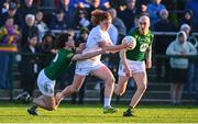 23 April 2024; Oisin Grufferty of Kildare in action against Shaun Leonard, left, and Eamonn Armstrong of Meath during the EirGrid Leinster GAA Football U20 Championship semi-final match between Kildare and Meath at Manguard Park at the Kildare GAA Centre of Excellence in Hawkfield, Kildare. Photo by Tyler Miller/Sportsfile