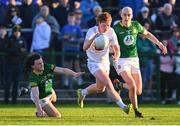 23 April 2024; Oisin Grufferty of Kildare in action against Shaun Leonard, left, and Eamonn Armstrong of Meath during the EirGrid Leinster GAA Football U20 Championship semi-final match between Kildare and Meath at Manguard Park at the Kildare GAA Centre of Excellence in Hawkfield, Kildare. Photo by Tyler Miller/Sportsfile