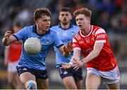 23 April 2024; Liam Flynn of Louth in action against Charlie McMorrow of Dublin during the EirGrid Leinster GAA Football U20 Championship semi-final match between Dublin and Louth at Parnell Park in Dublin. Photo by Sam Barnes/Sportsfile