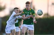 23 April 2024; Killian Smyth of Meath in action against Rob Fitzgerald of Kildare during the EirGrid Leinster GAA Football U20 Championship semi-final match between Kildare and Meath at Manguard Park at the Kildare GAA Centre of Excellence in Hawkfield, Kildare. Photo by Tyler Miller/Sportsfile
