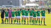 23 April 2024; Republic of Ireland players, from left, Aoife Sheridan, Jenna Willoughby, Kate Jones, Emma Gaughran, Heather Loomes, Chloe Wallace, Sarah McCaffrey, Aisling Meehan, Ella Kelly, Leah McGrath and Aoife Colbert-Martin stand for the playing of the National Anthem before the women's under 16's international friendly match between Republic of Ireland and Denmark at the FAI National Training Centre in Abbotstown, Dublin. Photo by Stephen McCarthy/Sportsfile