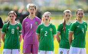 23 April 2024; Republic of Ireland players, from left, Aoife Sheridan, Jenna Willoughby, Kate Jones, Emma Gaughran and Heather Loomes stand for the playing of the National Anthem before the women's under 16's international friendly match between Republic of Ireland and Denmark at the FAI National Training Centre in Abbotstown, Dublin. Photo by Stephen McCarthy/Sportsfile
