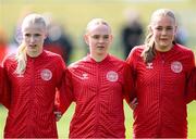23 April 2024; Denmark players, from left, Mathilde Brandt, Marie Dahlmann and Louise Strauss stand for the playing of the National Anthem before the women's under 16's international friendly match between Republic of Ireland and Denmark at the FAI National Training Centre in Abbotstown, Dublin. Photo by Stephen McCarthy/Sportsfile
