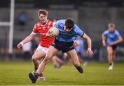 23 April 2024; Dan Murphy of Dublin in action against Liam Flynn of Louth during the EirGrid Leinster GAA Football U20 Championship semi-final match between Dublin and Louth at Parnell Park in Dublin. Photo by Sam Barnes/Sportsfile
