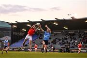23 April 2024; Kieran McArdle of Louth in action against Finn Bruton of Dublin during the EirGrid Leinster GAA Football U20 Championship semi-final match between Dublin and Louth at Parnell Park in Dublin. Photo by Sam Barnes/Sportsfile