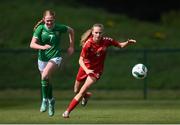 23 April 2024; Sophia Parkegaard of Denmark in action against Aisling Meehan of Republic of Ireland during the women's under 16's international friendly match between Republic of Ireland and Denmark at the FAI National Training Centre in Abbotstown, Dublin. Photo by Stephen McCarthy/Sportsfile