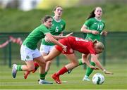 23 April 2024; Heather Loomes of Republic of Ireland in action against Louise Strauss of Denmark during the women's under 16's international friendly match between Republic of Ireland and Denmark at the FAI National Training Centre in Abbotstown, Dublin. Photo by Stephen McCarthy/Sportsfile