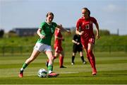 23 April 2024; Sarah McCaffrey of Republic of Ireland in action against Louise Strauss of Denmark during the women's under 16's international friendly match between Republic of Ireland and Denmark at the FAI National Training Centre in Abbotstown, Dublin. Photo by Stephen McCarthy/Sportsfile