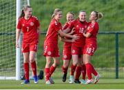 23 April 2024; Astrid Baltersen, 18, celebrates with her Denmark team-mates, from left, Andrea Thierry, 7, Ida Skræddergaard Philipsen, Albert Mott and Julie Olander, 10, after scoring their side's goal during the women's under 16's international friendly match between Republic of Ireland and Denmark at the FAI National Training Centre in Abbotstown, Dublin. Photo by Stephen McCarthy/Sportsfile