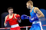 24 April 2024; Adam Hession of Ireland, left, in action against Eduard Savvin of Russia during their Men's 57kg Featherweight quarter-final bout during the 2024 European Boxing Championships at Aleksandar Nikolic Hall in Belgrade, Serbia. Photo by Nikola Krstic/Sportsfile
