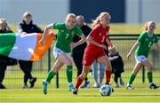23 April 2024; Aisling Meehan of Republic of Ireland in action against Selma Karstensen of Denmark during the women's under 16's international friendly match between Republic of Ireland and Denmark at the FAI National Training Centre in Abbotstown, Dublin. Photo by Stephen McCarthy/Sportsfile