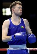 24 April 2024; Dean Clancy of Ireland in action against Malik Hasanov of Azerbaijan in their Men's 63.5kg Light Welterweight quarter-final bout during the 2024 European Boxing Championships at Aleksandar Nikolic Hall in Belgrade, Serbia. Photo by Nikola Krstic/Sportsfile