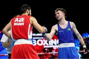 24 April 2024; Dean Clancy of Ireland, right, and Malik Hasanov of Azerbaijan after their Men's 63.5kg Light Welterweight quarter-final bout during the 2024 European Boxing Championships at Aleksandar Nikolic Hall in Belgrade, Serbia. Photo by Nikola Krstic/Sportsfile