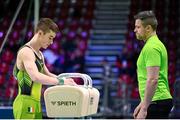 25 April 2024; James Hickey of Ireland, left, with Men's Junior coach Andrew Smith, before competing in the Men's Junior Pommel Horse qualification subdivision 1 on day two of the 2024 Men's Artistic Gymnastics European Championships at Fiera di Rimini in Rimini, Italy. Photo by Filippo Tomasi/Sportsfile