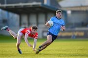 23 April 2024; Greg McEneaney of Dublin in action against Sean Callaghan of Louth during the EirGrid Leinster GAA Football U20 Championship semi-final match between Dublin and Louth at Parnell Park in Dublin. Photo by Sam Barnes/Sportsfile