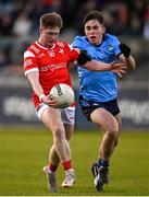 23 April 2024; Liam Flynn of Louth in action against Seán Kirwan of Dublin during the EirGrid Leinster GAA Football U20 Championship semi-final match between Dublin and Louth at Parnell Park in Dublin. Photo by Sam Barnes/Sportsfile