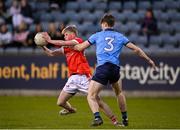 23 April 2024; Diarmuid Reilly of Louth in action against Finn Bruton of Dublin during the EirGrid Leinster GAA Football U20 Championship semi-final match between Dublin and Louth at Parnell Park in Dublin. Photo by Sam Barnes/Sportsfile