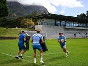 25 April 2024; Scott Penny, right, with elite player development officer Aaron Dundon and Aitzol King during a Leinster Rugby squad training session at the South African College High School in Cape Town, South Africa. Photo by Harry Murphy/Sportsfile