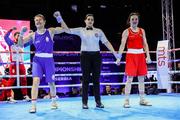 25 April 2024; Kellie Harrington of Ireland, right, looks on as Natalia Shadrina of Serbia is declared victorious in their Women's 60kg Lightweight semi-final bout during the 2024 European Boxing Championships at Aleksandar Nikolic Hall in Belgrade, Serbia. Photo by Nikola Krstic/Sportsfile