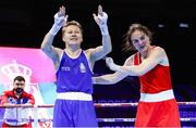 25 April 2024; Kellie Harrington of Ireland, right, looks on as Natalia Shadrina of Serbia is declared victorious in their Women's 60kg Lightweight semi-final bout during the 2024 European Boxing Championships at Aleksandar Nikolic Hall in Belgrade, Serbia. Photo by Nikola Krstic/Sportsfile