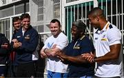 25 April 2024; Ahead of their game on Saturday in the BKT United Rugby Championship, Leinster Rugby and DHL Stormers players, coaches and staff visited and took part in a rugby session in Zimasa Primary School, pictured is Cian Healy, centre, with DHL Stormers players Gary Porter, Scarra Ntubeni and Ben Loader at Zimasa Primary School in Lunga, Cape Town. Photo by Harry Murphy/Sportsfile