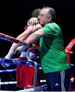 25 April 2024; Aoife O'Rourke of Ireland is embraced by coach Zaur Antia after her Women's 75kg Middleweight semi-final bout against Isildar Busra of Turkey during the 2024 European Boxing Championships at Aleksandar Nikolic Hall in Belgrade, Serbia. Photo by Nikola Krstic/Sportsfile