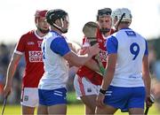 21 April 2024; Darragh Fitzgibbon of Cork tussles with Iarlaith Daly, left, and Neil Montgomery of Waterford during the Munster GAA Hurling Senior Championship Round 1 match between Waterford and Cork at Walsh Park in Waterford. Photo by Brendan Moran/Sportsfile