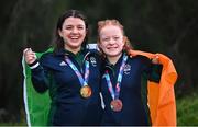 25 April 2024; Ireland swimmers Nicole Turner, joint gold medallist, left, and Dearbhaile Brady, bronze medallist, after the Women's 50m Freestyle S6 Final during day five of the Para Swimming European Championships at the Penteada Olympic Pools Complex in Funchal, Portugal. Photo by Ramsey Cardy/Sportsfile