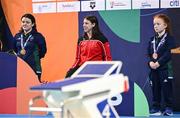 25 April 2024; On the podium after the Women's 50m Freestyle S6 Final are, from left, joint gold medallists Nicole Turner of Ireland and Nora Meister of Switzerland, and bronze medallist Dearbhaile Brady of Ireland, during day five of the Para Swimming European Championships at the Penteada Olympic Pools Complex in Funchal, Portugal. Photo by Ramsey Cardy/Sportsfile