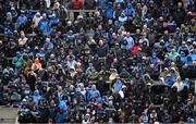 14 April 2024; Dublin supporters shelter from the rain on Hill 16 during the Leinster GAA Football Senior Championship quarter-final match between Dublin and Meath at Croke Park in Dublin. Photo by Brendan Moran/Sportsfile