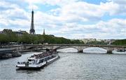 18 April 2024; A passenger boat travels down the river Seine in Paris ahead of the XXXIII Summer Olympic Games which takes place in July and August in France. Photo by Brendan Moran/Sportsfile