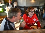 26 April 2024; Shelbourne supporters Bernadette and Mark Fraser enjoy a coffee before the SSE Airtricity Men's Premier Division match between Shelbourne and St Patrick's Athletic at Tolka Park in Dublin. Photo by David Fitzgerald/Sportsfile