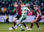 26 April 2024; David Hurley of Galway United, supported by team-mate Conor McCormack, right, in action againstRory Gaffney of Shamrock Rovers during the SSE Airtricity Men's Premier Division match between Shamrock Rovers and Galway United at Tallaght Stadium in Dublin. Photo by Piaras Ó Mídheach/Sportsfile