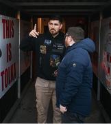 26 April 2024; Former Shelbourne goalkeeper and Love Island contestant Scott van-der-Sluis with media officer Darren Cleary before the SSE Airtricity Men's Premier Division match between Shelbourne and St Patrick's Athletic at Tolka Park in Dublin. Photo by David Fitzgerald/Sportsfile