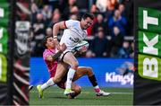 26 April 2024; Jacob Stockdale of Ulster is tackled by Jacob Umaga of Benetton on his way to scoring his side's third try during the United Rugby Championship match between Ulster and Benetton at Kingspan Stadium in Belfast. Photo by Ben McShane/Sportsfile