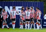 26 April 2024; Will Patching of Derry City, 8, is congratulated by team-mates after scoring his sides first goal during the SSE Airtricity Men's Premier Division match between Waterford and Derry City at Regional Sports Centre in Waterford. Photo by Michael P Ryan/Sportsfile