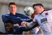 26 April 2024; Zak Bradshaw of Dundalk in action against James Akintunde, bottom, and Jevon Mills of Bohemians during the SSE Airtricity Men's Premier Division match between Dundalk and Bohemians at Oriel Park in Dundalk, Louth. Photo by Stephen McCarthy/Sportsfile