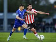26 April 2024; Patrick Hoban of Derry City in action against Darragh Leahy of Waterford during the SSE Airtricity Men's Premier Division match between Waterford and Derry City at Regional Sports Centre in Waterford. Photo by Michael P Ryan/Sportsfile