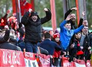 26 April 2024; Shelbourne supporters celebrate their side's first goal during the SSE Airtricity Men's Premier Division match between Shelbourne and St Patrick's Athletic at Tolka Park in Dublin. Photo by David Fitzgerald/Sportsfile