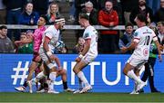 26 April 2024; Will Addison of Ulster celebrates with teammate Ethan McIlroy, right, after scoring their side's fourth try during the United Rugby Championship match between Ulster and Benetton at Kingspan Stadium in Belfast. Photo by Ben McShane/Sportsfile