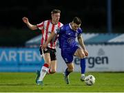 26 April 2024; Darragh Leahy of Waterford in action against Daniel Kelly of Derry City during the SSE Airtricity Men's Premier Division match between Waterford and Derry City at Regional Sports Centre in Waterford. Photo by Michael P Ryan/Sportsfile