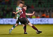 26 April 2024; Karl O'Sullivan of Galway United in action against Trevor Clarke of Shamrock Rovers during the SSE Airtricity Men's Premier Division match between Shamrock Rovers and Galway United at Tallaght Stadium in Dublin. Photo by Piaras Ó Mídheach/Sportsfile