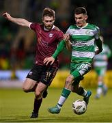 26 April 2024; Trevor Clarke of Shamrock Rovers in action against Karl O'Sullivan of Galway United during the SSE Airtricity Men's Premier Division match between Shamrock Rovers and Galway United at Tallaght Stadium in Dublin. Photo by Piaras Ó Mídheach/Sportsfile