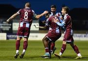26 April 2024; Frantz Pierrot of Drogheda United celebrates with teammates Gary Deegan, right, Adam Foley, behind, and Aaron McNally, left, after scoring his side's second goal during the SSE Airtricity Men's Premier Division match between Drogheda United and Sligo Rovers at Weavers Park in Drogheda, Louth. Photo by Shauna Clinton/Sportsfile