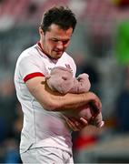 26 April 2024; Jacob Stockdale of Ulster celebrates with his daughter Bonnie, age 8 weeks, during the United Rugby Championship match between Ulster and Benetton at Kingspan Stadium in Belfast. Photo by Ben McShane/Sportsfile