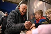 26 April 2024; Dundalk manager Noel King signs autographs for supporters after the SSE Airtricity Men's Premier Division match between Dundalk and Bohemians at Oriel Park in Dundalk, Louth. Photo by Stephen McCarthy/Sportsfile