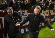 26 April 2024; Shelbourne manager Damien Duff pulls supporter Ciaran Harmon out of the crowd to join the team after the SSE Airtricity Men's Premier Division match between Shelbourne and St Patrick's Athletic at Tolka Park in Dublin. Photo by David Fitzgerald/Sportsfile