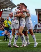 26 April 2024; Will Addison of Ulster celebrates with teammate John Cooney and Ethan McIlroy after scoring their side's fourth try during the United Rugby Championship match between Ulster and Benetton at Kingspan Stadium in Belfast. Photo by John Dickson/Sportsfile